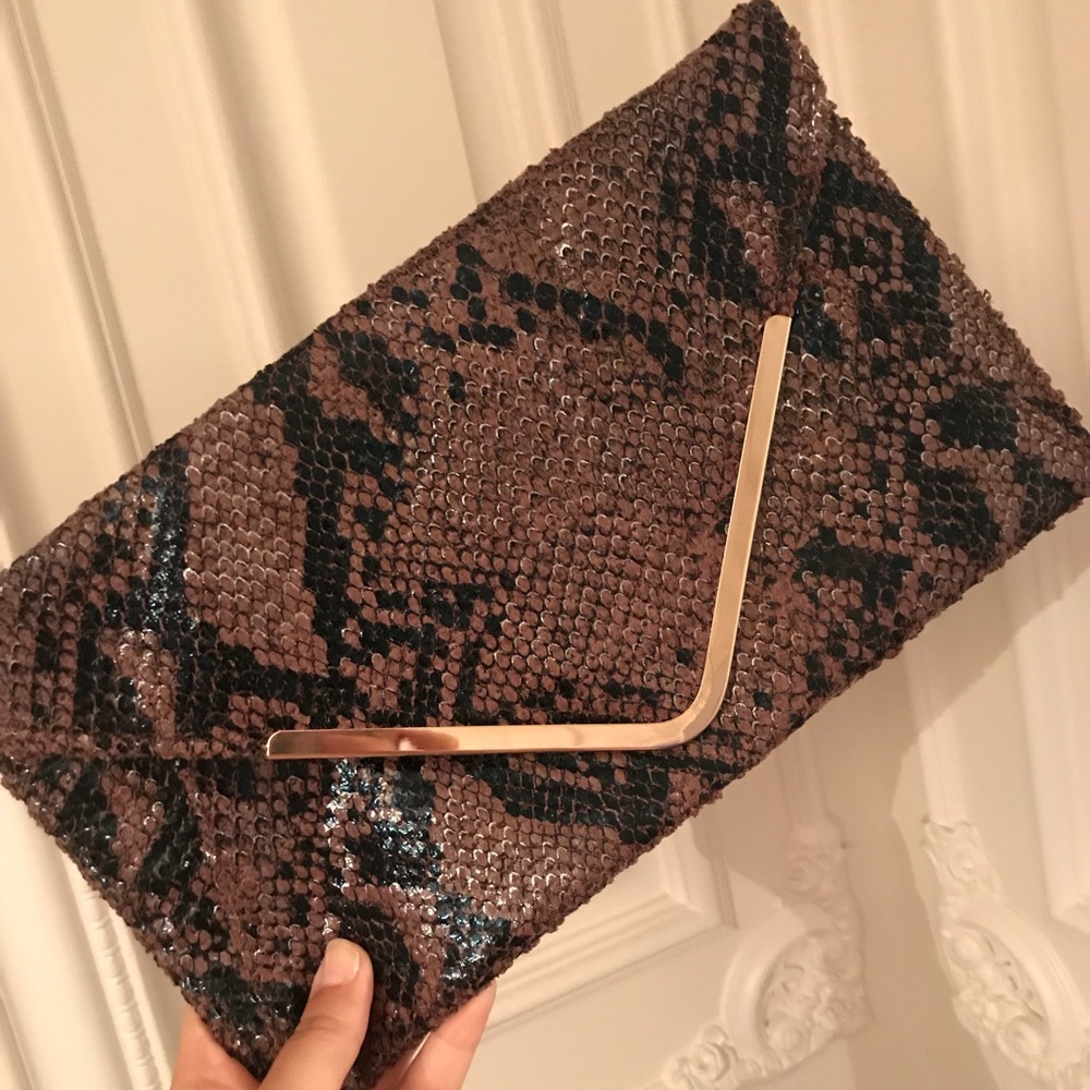 Brown snakeskin envelope clutch